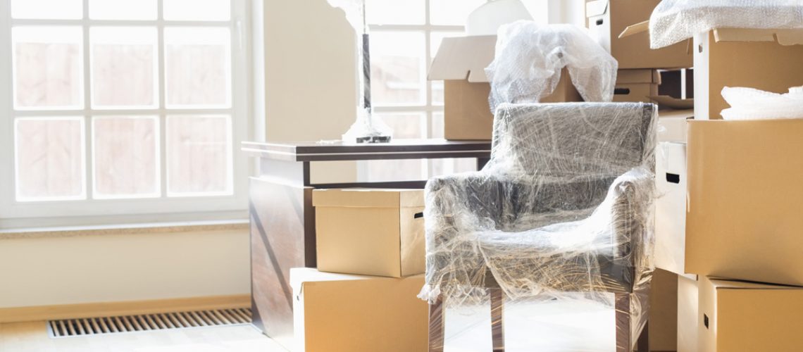 Boxes and furniture being prepared to be moved
